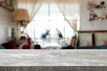 Empty wooden table space platform and blurred restaurant or coffee shop background for product display montage.