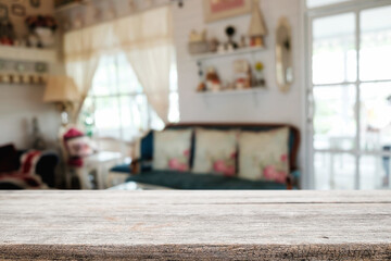 Empty wooden table space platform and blurred restaurant or coffee shop background for product display montage.