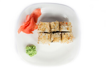 Rolls, ginger and wasabi sauce on a white background. View from above.