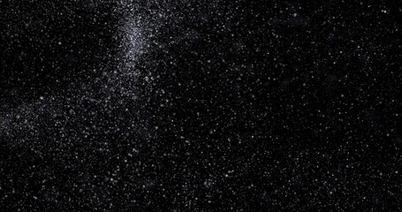abstract Flying dust particles on a black background