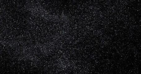 abstract Flying dust particles on a black background