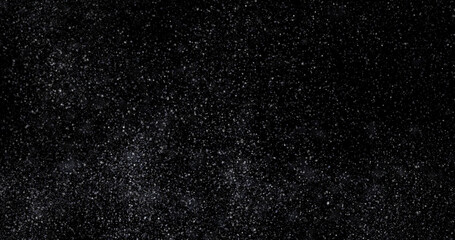 abstract Flying dust particles on a black background