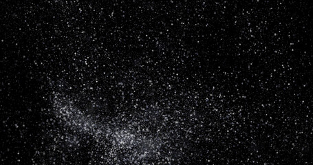 abstract Flying dust particles on a black background