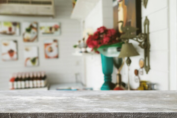 Empty wooden table space platform and blurred restaurant or coffee shop background for product display montage.