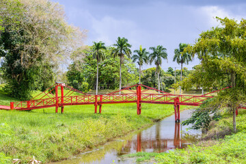 Fototapeta premium It's Red bridge over the river in Suriname