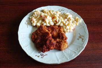 Fried chicken steak with potato salad