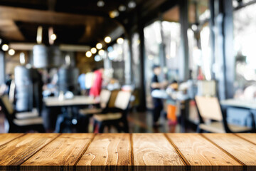 Empty wooden desk space platform over blurred restaurant or coffee shop background for product display montage.