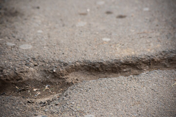 Horizontal crack in the asphalt surface