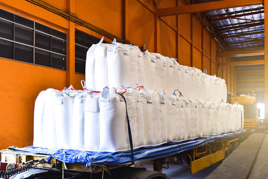 Truck Load Jumbo Bags Of Tapioca Starch At Warehouse Dock For Export Through Port. Agro-industrial Product Logistics And Supply Chain.