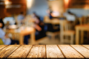 Empty wooden table space platform and blurred resturant or coffee shop background for product display montage.