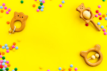 Fototapeta premium kids desk with toys and candy from above space for text