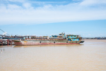 Fototapeta na wymiar Freight ships on the Jiaomen waterway at the Pearl River estuary in Guangzhou, Guangdong