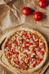 Close up of neapolitan pizza bolognese. Fresh basil,tomato sauce, mozzarella cheese , mushrooms and minced meat