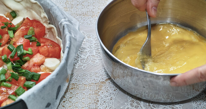Prepare tasty piece of tarta pastry with salmon, chive and basilia.