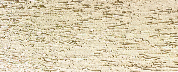 abstract background close up on an beige exterior wall