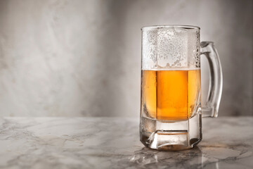 Cold beer concept on marble floor