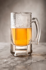 Cold beer concept on marble floor