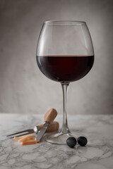 Red wine concept on marble floor