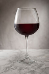 Red wine concept on marble floor