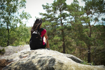 Naklejka na ściany i meble asian woman hiking in forest