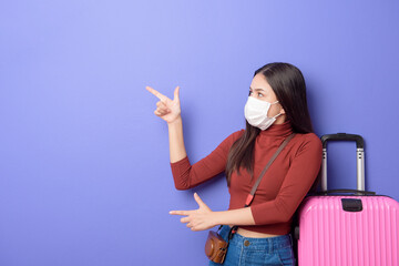 portrait of young traveler woman with face mask , New normal travel concept