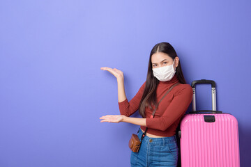 portrait of young traveler woman with face mask , New normal travel concept