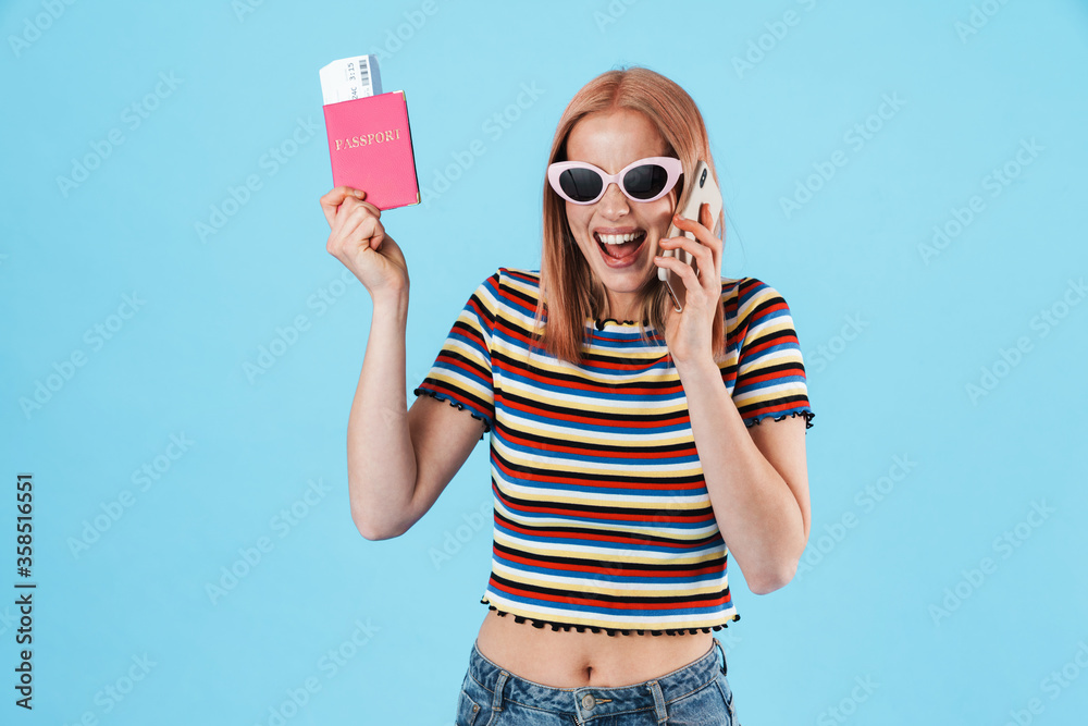 Sticker image of woman holding passport with tickets and talking on cellphone