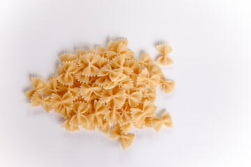 Pasta on a white background. bow. Variety of types and shapes of Italian pasta.