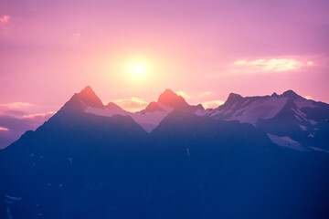 Fototapeta premium Mountain range on the horizon. Rocks at sunset. Beautiful rocky scene in the evening. Wilderness, beautiful nature of Norway, Europe