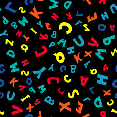 Seamless pattern of multicolored letters on black background. Vector illustration.