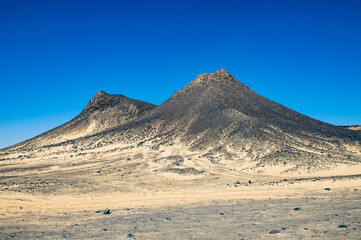 Fototapeta na wymiar It's Black desert, Bahariya Oasis area, Egypt, Africa