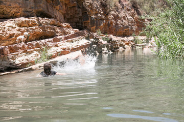 A group of people are swimming in the lake. Paradise Valley Agadir Morocco.