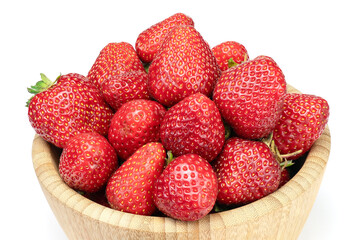 Fresh strawberries in wooden bowl isolated on white background. Full depth of field with clipping path.