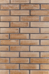 Structured surface of brown brick wall, grunge background
