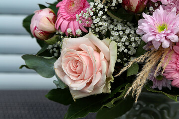 Fragments of a floral bouquet with beautiful roses