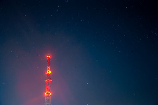 Radio Tower On Night Starry Sky Background