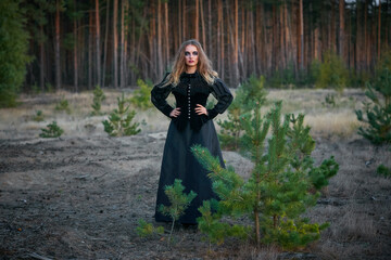 girl witch witch in a dark pine forest