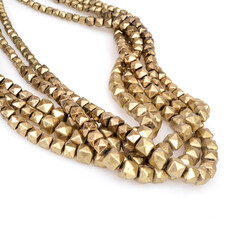 Obraz premium Golden necklaces isolated on a white background