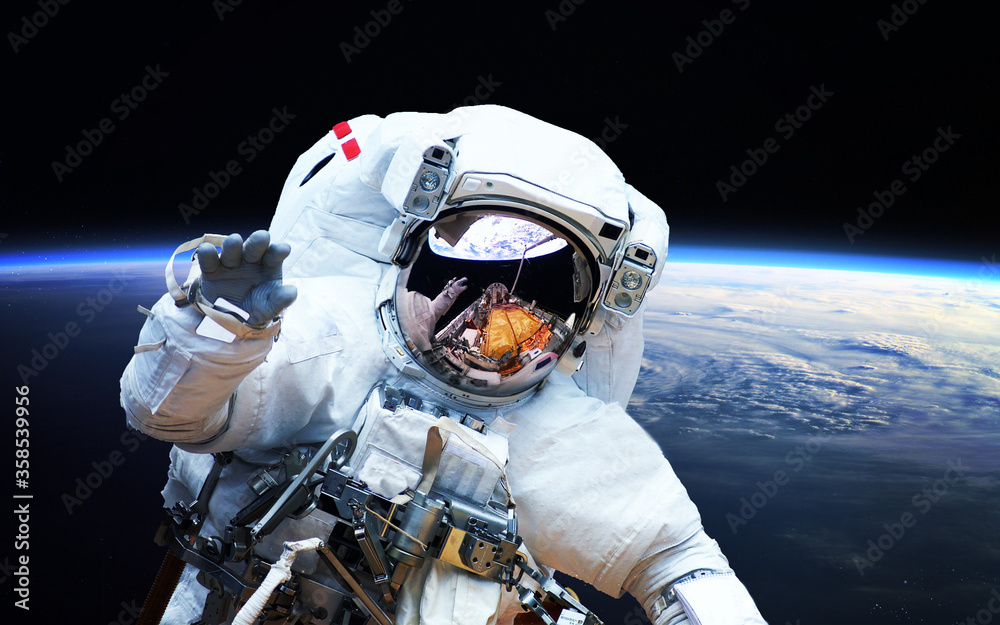 Wall mural astronaut in outer space. spacewalk. elements of this image furnished by nasa