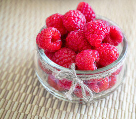
photo of raspberries in a bowl