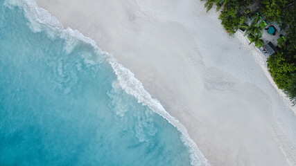 Seychelles beach Indian ocean from drone, shore and mountains. 