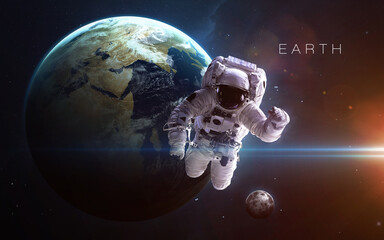 Obraz na płótnie Canvas Earth and astronaut