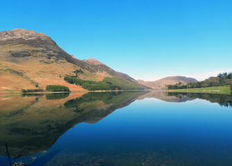 landscape view of Buttermere in the Lake District, Cumbria, UK with reflections