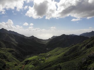 valley of the island with jungles and hills photographed from the air