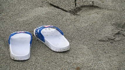 flip flops on the beach