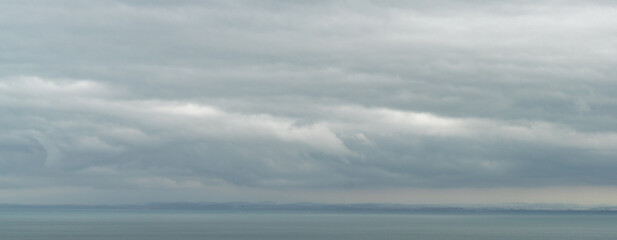 panaroma landscape view of Lake Constance with stormy clouds and rainy weather atmosphere