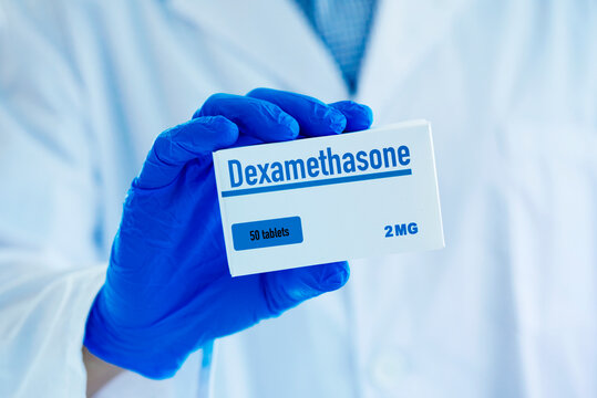 man with a simulated box of dexamethasone