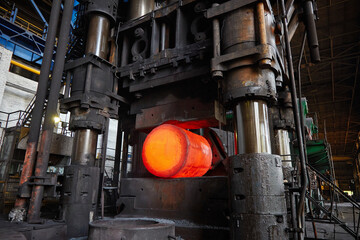 Press-Forging Shop. Forging a hot steel ingot.