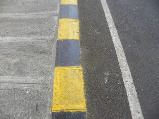 Asphalt road textured background with yellow and white line