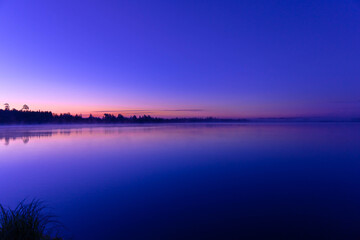 Fototapeta premium Dawn forest by the river